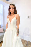 Glamorous A-Line Spaghetti Straps Sweetheart Satin Backless Wedding Dress With Pockets