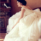 Princess Wedding Dresses Ball Gown Pearls Open Back Chapel Train Bridal Gowns